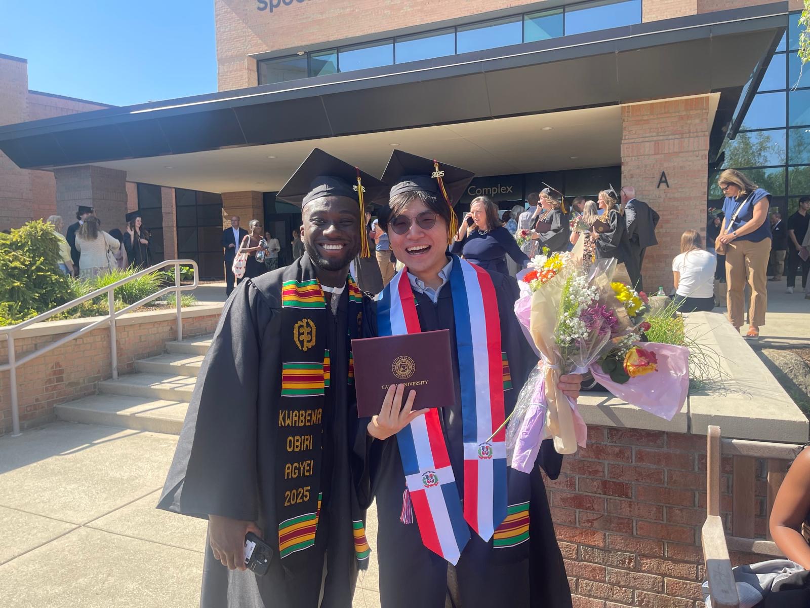 Hadong celebrating graduation with a close friend.